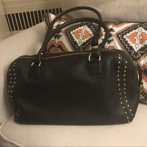 MK michael Kors black studded bag.